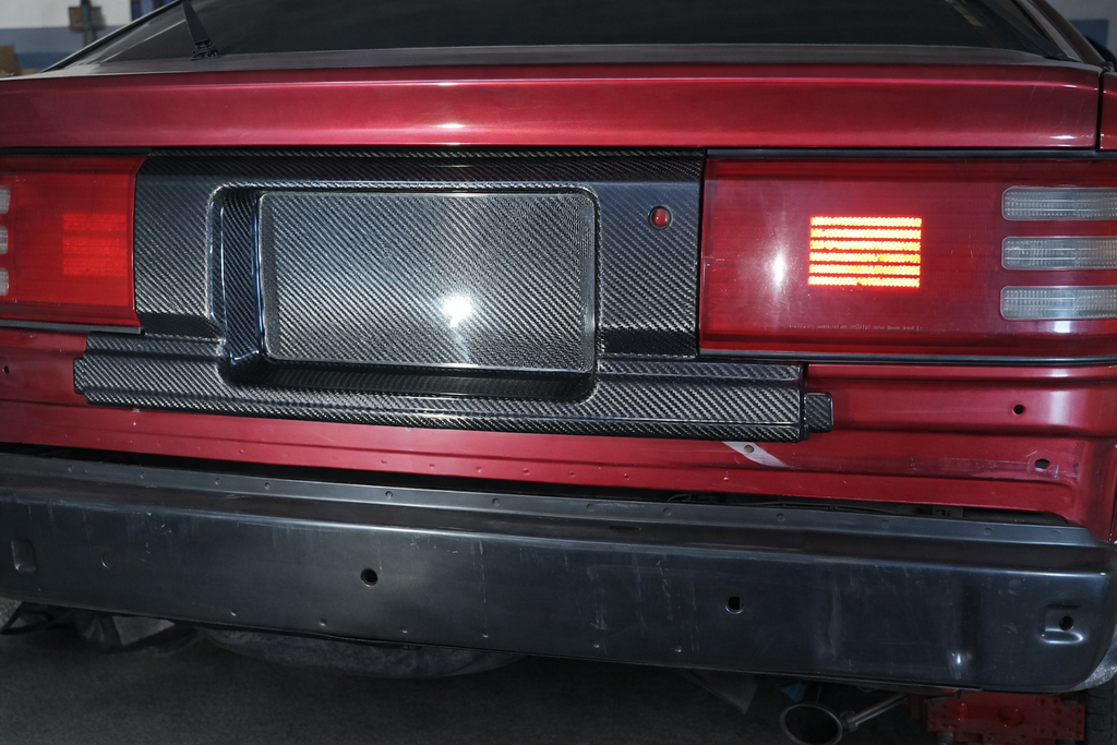 DPG Center Tail Light Garnish/License Plate Holder/Trim Moulding 1989-1992 - MK3 Toyota Supra (A70)